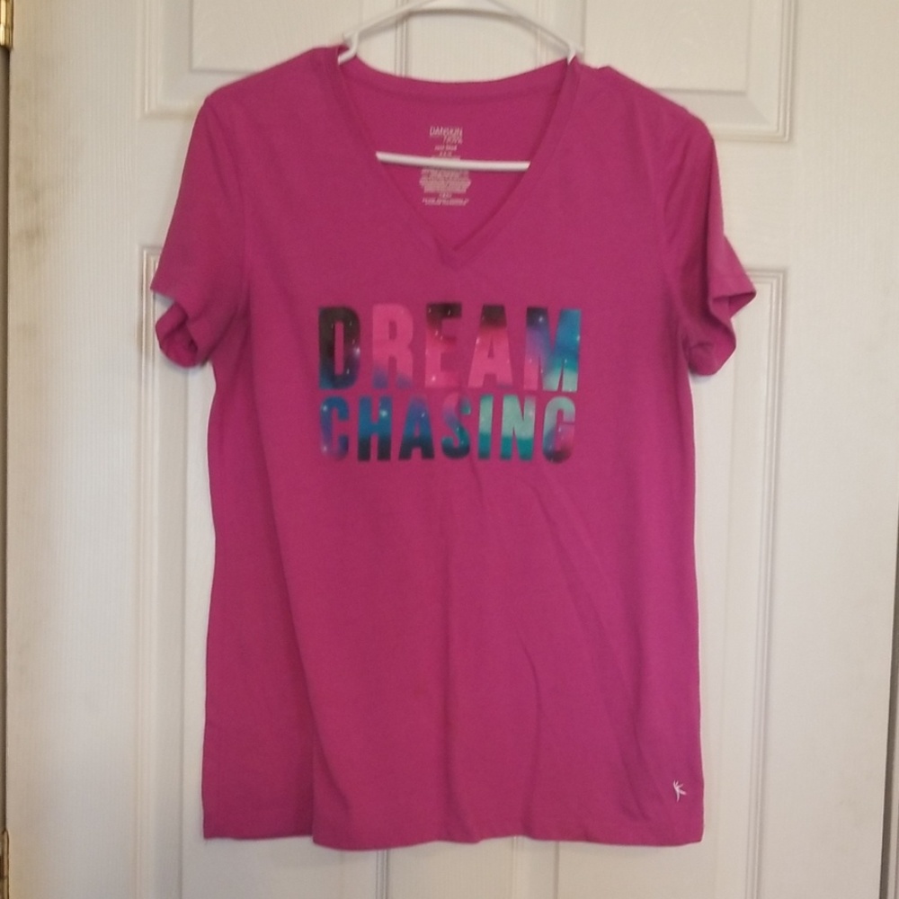 I am selling a pink danskin tshirt with words